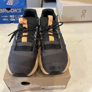 On Running Women’s Black and Tan Athletic Sneakers